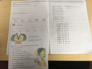 This picture shows a student's workbook with an exercise solving probability questions.