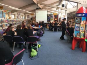 This picture shows a classroom at Romsey School with students working.