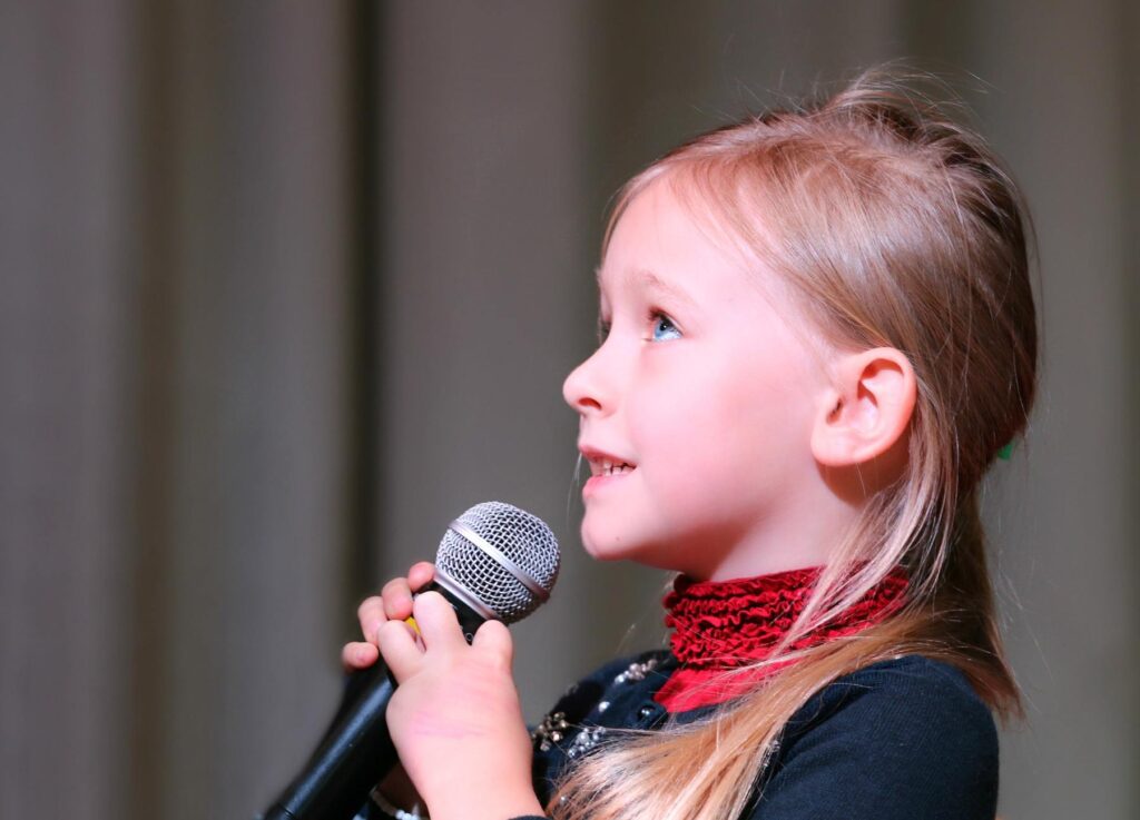 Child with microphone