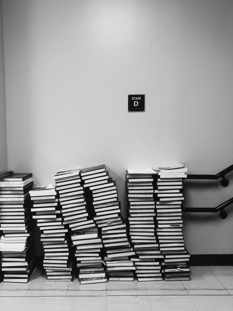 Pile of books teaching marking