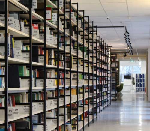 A full bookshelf in a library