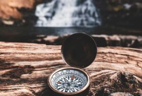 A compass on a rock