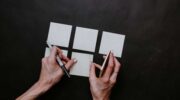 Laying out post-it notes on a table